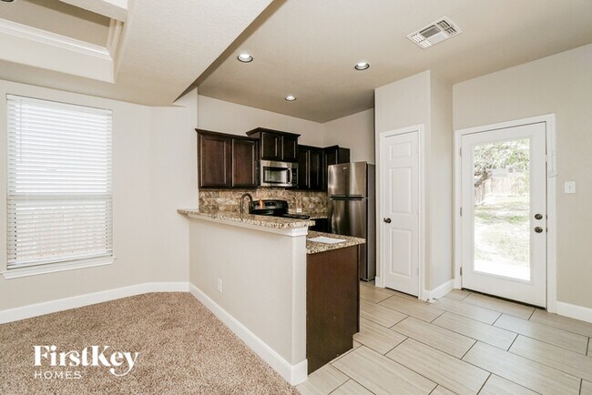 Building Photo - 6630 Woodstock Dr