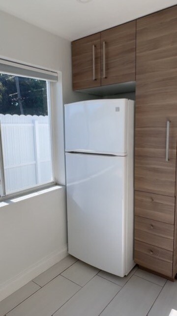 Pantry and fridge. - 2415 Thomas St