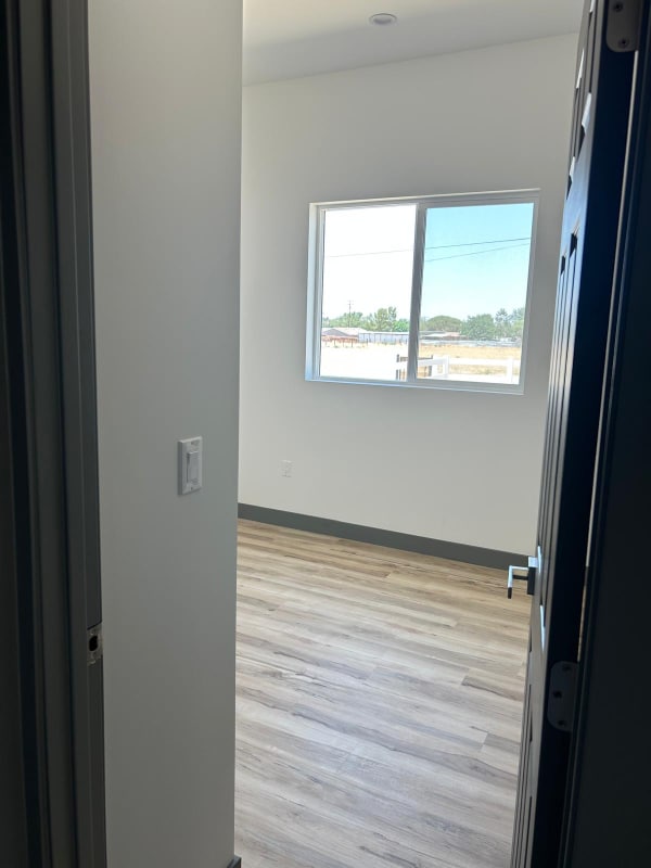 Building Photo - 9220 E Ave T 6