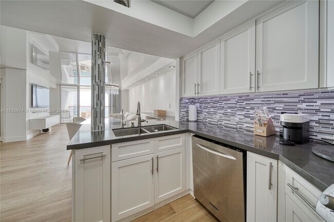 Building Photo - 6767 Collins Ave