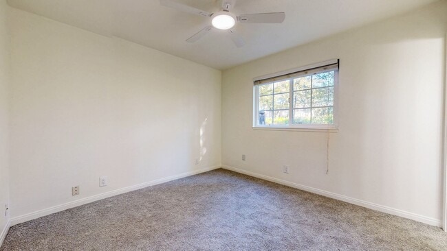 Building Photo - Cozy 1 bedroom 1 bath end unit condo with 1 car garage and private patio located next to Peterson...