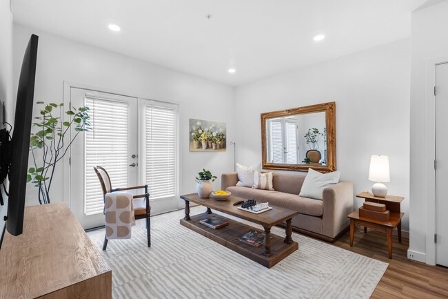 1 BR - 727 - Living Room 03-min - The Ivory at Woodruff