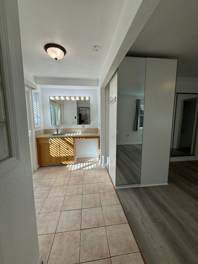 Building Photo - Hard floors, extra closets, patios & fenced yard