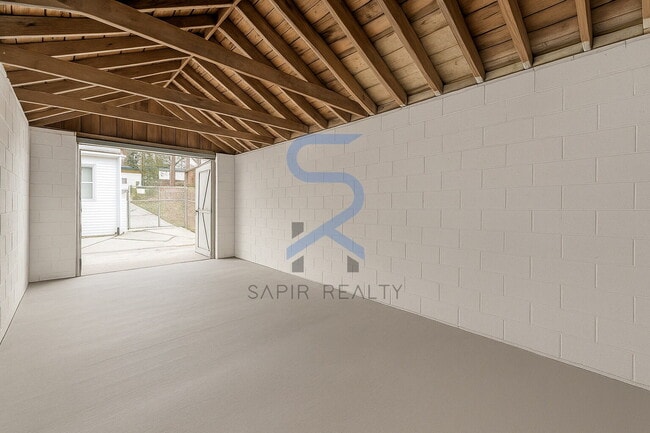 Building Photo - Move in before January 15th and choose your reward: a $250 Amazon Gift Card or a 55" Smart TV!