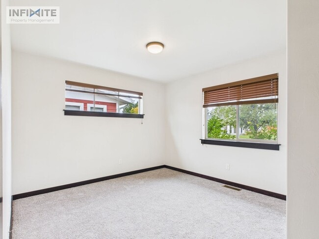Building Photo - Single-Level 4BR with 3-Car Garage & Fence...