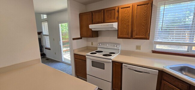 Building Photo - Charming 4-Bed Home in Louisville features bright, open living space, with open deck & garden!
