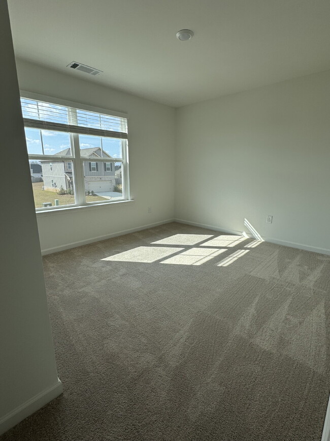 Building Photo - "Spacious 5-Bedroom NEW HOME on Rolling Meadow Way - Your Dream Home Awaits in Kathleen!"