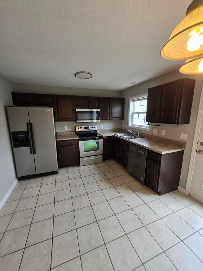 Building Photo - Spacious 2-Bedroom Townhome – Private Deck...