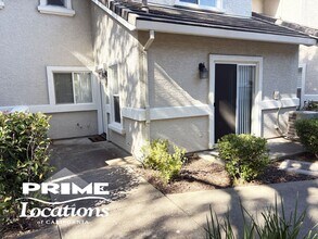Building Photo - Best value 3 bedroom condo with attached garage