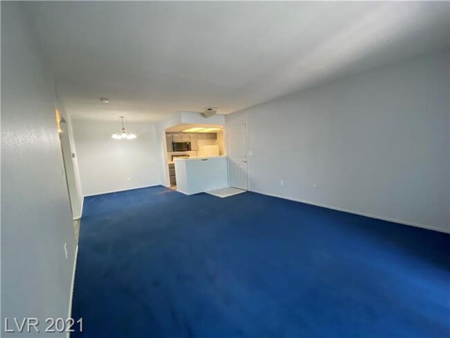 Building Photo - Charming 1-Bedroom Condo in Gated 89128 Co...
