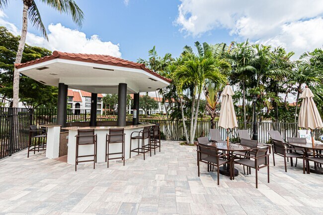 Building Photo - Ground-Level Comfort in North Naples – 2BR Condo in Fairway Preserve at Olde Cypress