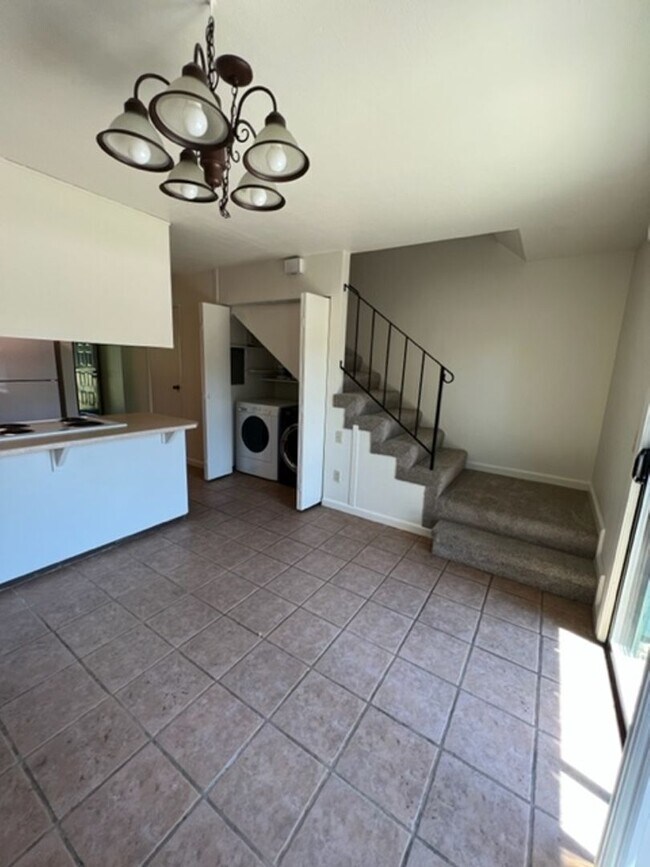 Building Photo - Spacious Condo with Private Patio