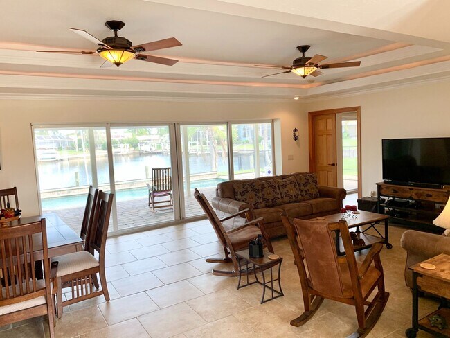 Building Photo - AVAILABLE 2027 SEASON! ! PGI HEATED POOL, WATERFRONT, BOAT LIFT