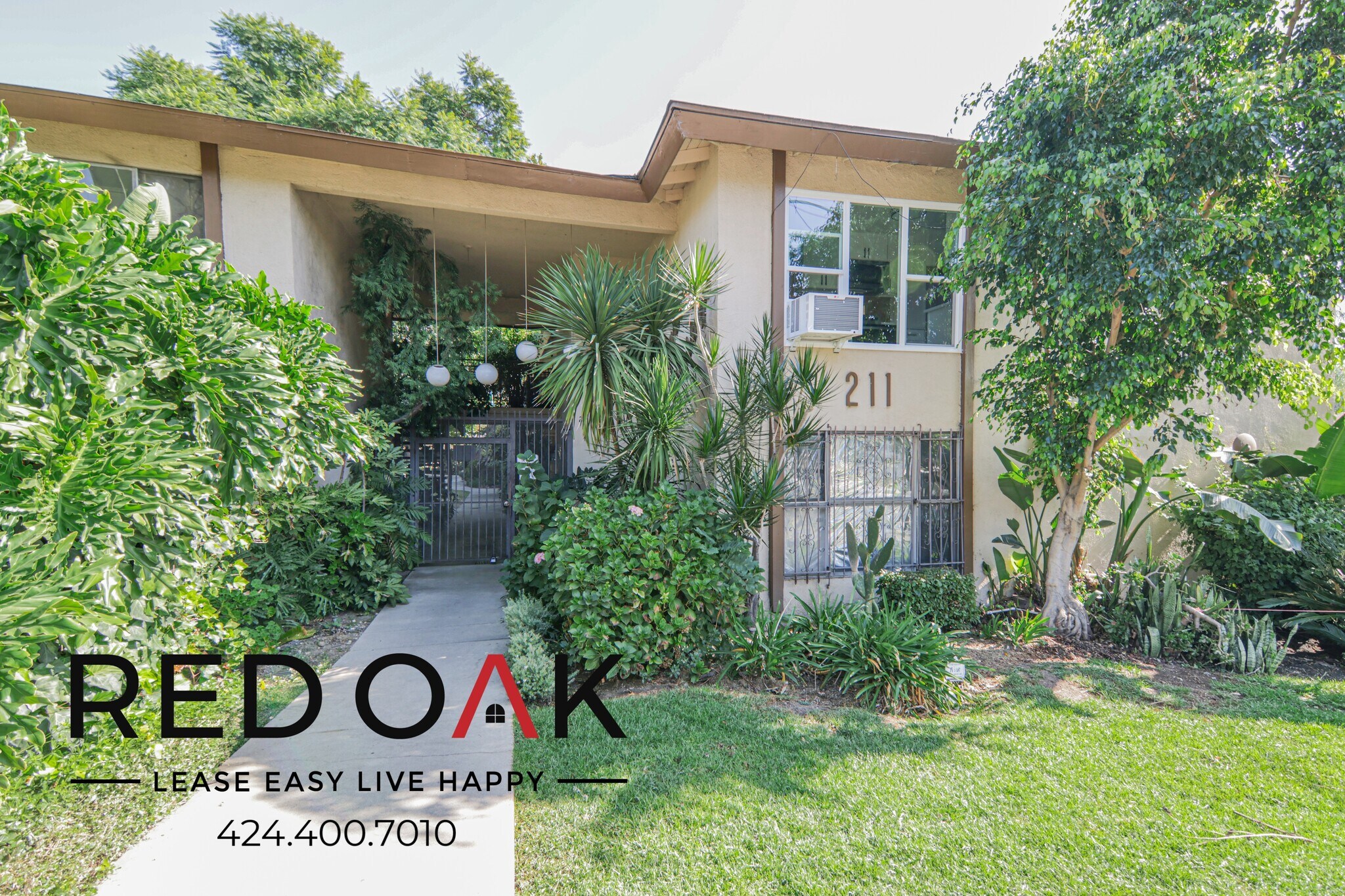 Building Photo - 211 S Ave 57