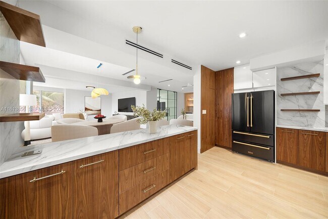 Building Photo - 5255 Collins Ave