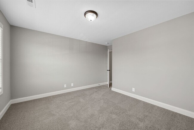Building Photo - Beautiful 4-Bedroom Home with Modern Comfo...