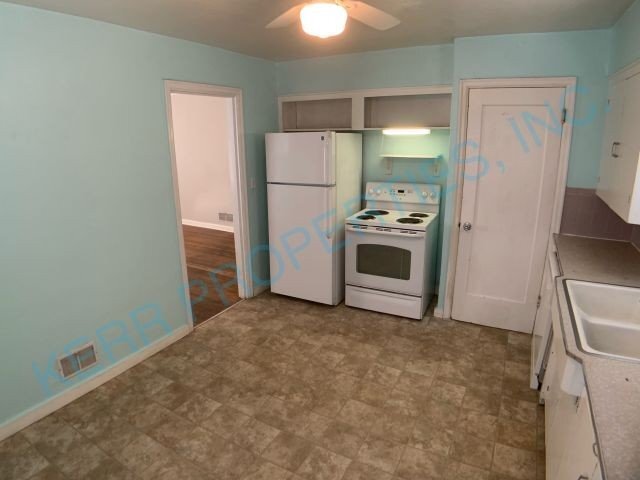 Building Photo - FREE RENT! Cozy tri-level 1374 square foot...