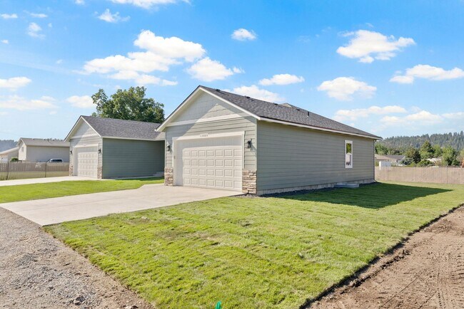 Building Photo - Newly built 4 Bedroom Duplex With Garage