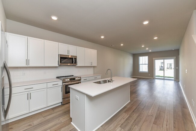 Building Photo - **2022-BUILT TOWNHOME WITH FABULOUS COMMUN...