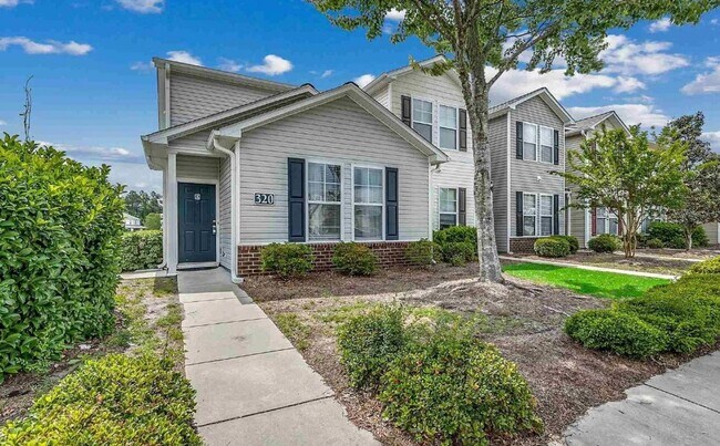 Primary Photo - Relax and Unwind in this Spacious End-Unit...