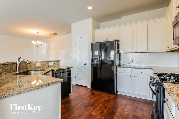 Building Photo - 210 Firewheel Ct