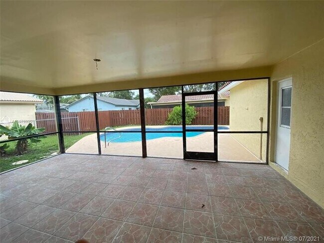Building Photo - 9658 NW 28th Ct
