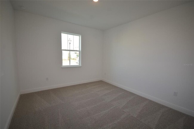 Building Photo - 5144 Firebush Dr