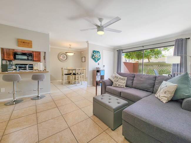 The super comfy couch is also a pull-out queen-sized bed! - 3500 N Hayden Rd