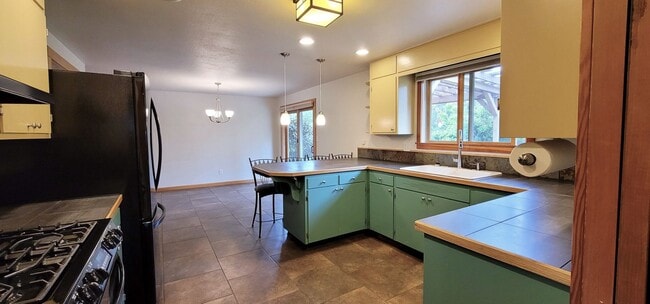 Building Photo - Gorgeous 4-bedroom home including a Two Car Garage and Spacious Backyard with a Shaded Patio