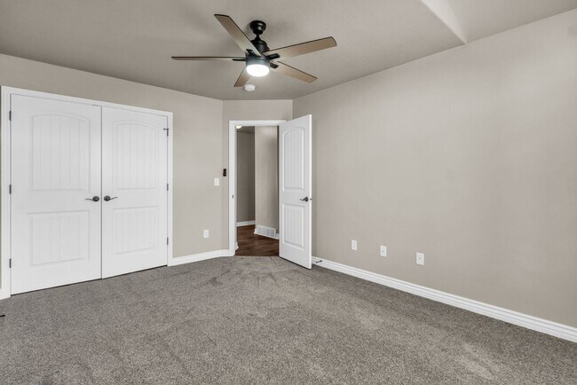 Building Photo - Spacious Syracuse Home with Covered Deck, Loft & Oversized 3-Car Garage