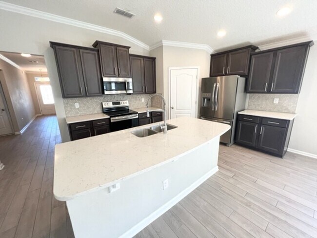 Building Photo - Introducing this stunning 4-bedroom, 2-bat...