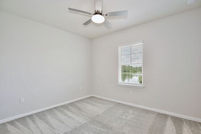 Building Photo - Modern 5/3 Water-View Home in Weslyn Park ...