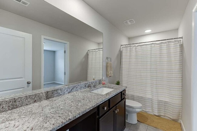 Building Photo - 6029 Fair Winds Cv