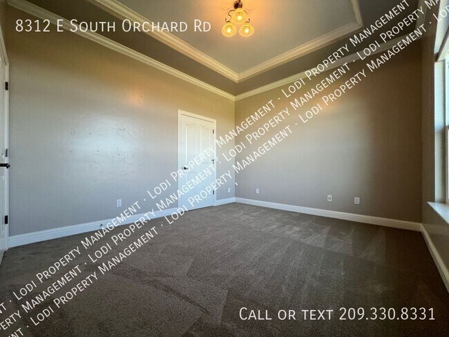 Building Photo - 8312 E Orchard Rd