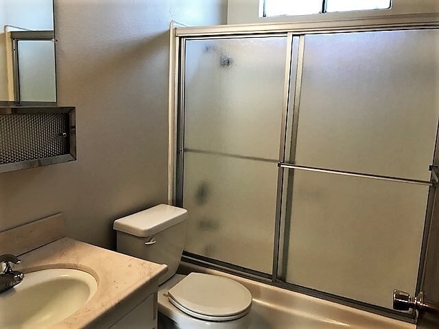 Building Photo - 2 Bedroom Townhouse with Fenced Yard by Harloe Elementary School