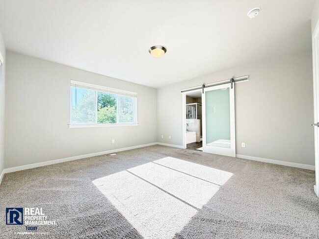 Building Photo - Modern 5-Bedroom Home with Mother-In-Law Suite & Covered Patio!