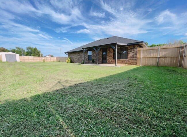 Building Photo - Fenced yard/Storage building/Close to college/Paved street