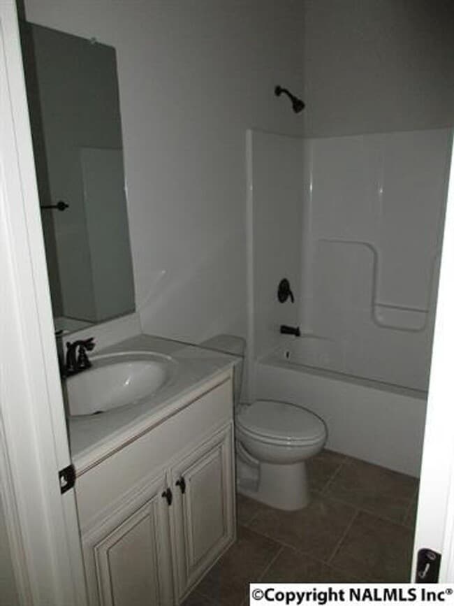 Building Photo - LIKE NEW!  FOUR BEDROOM BRICK HOME IN HAZE...
