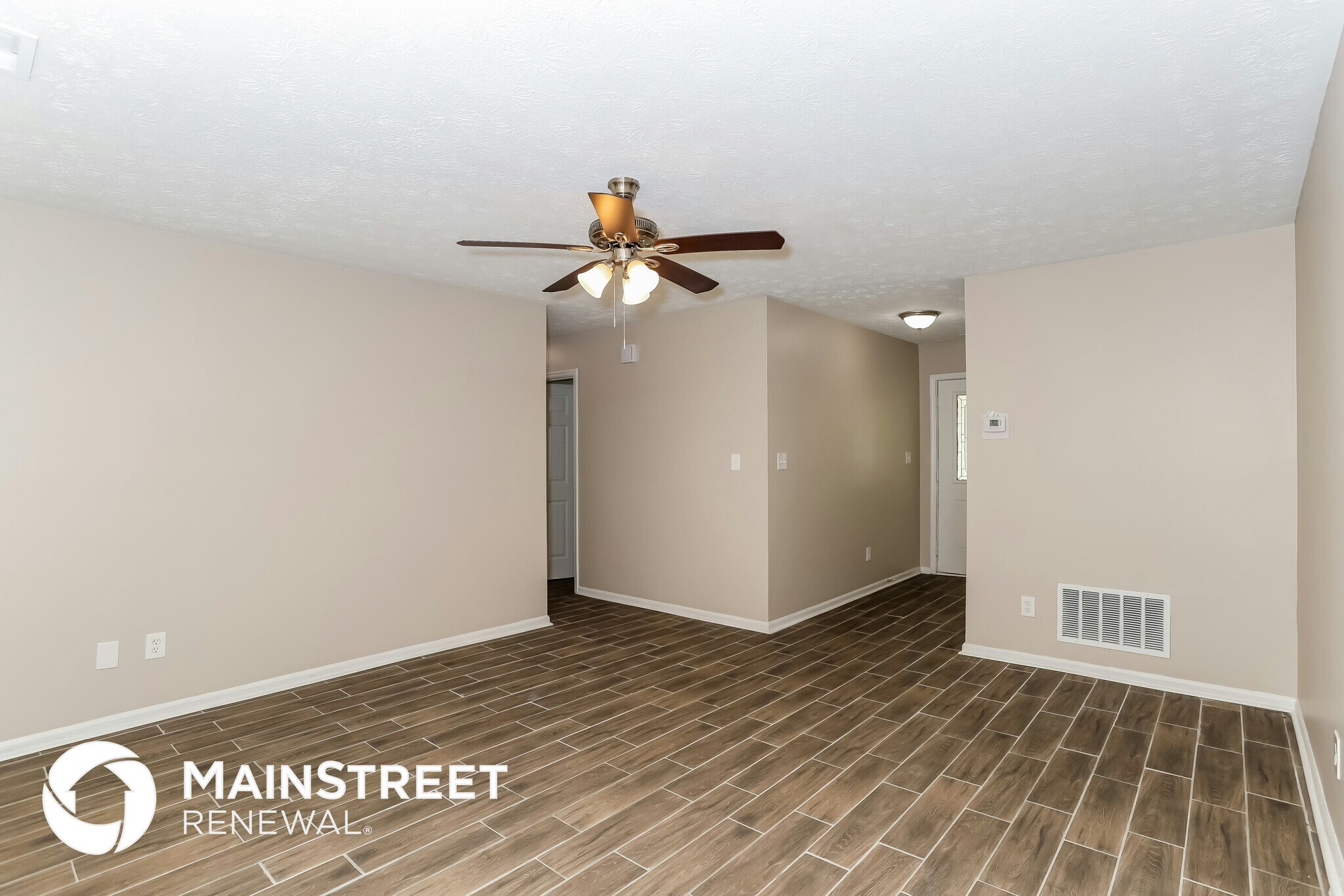 Building Photo - 9073 Woodgreen Way