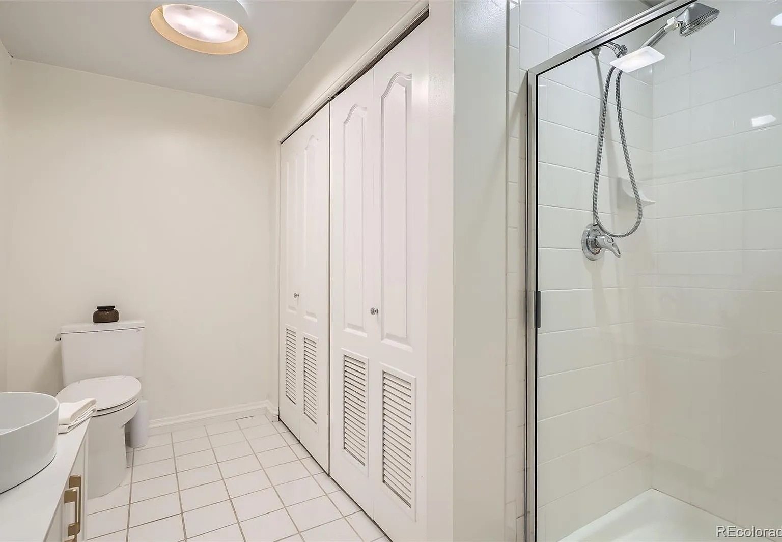 guest bathroom/laundry - 300 W 11th Ave