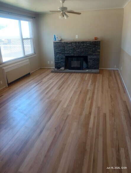 Refinished hardwood living room floor - 1200 NE Ochoco Ave