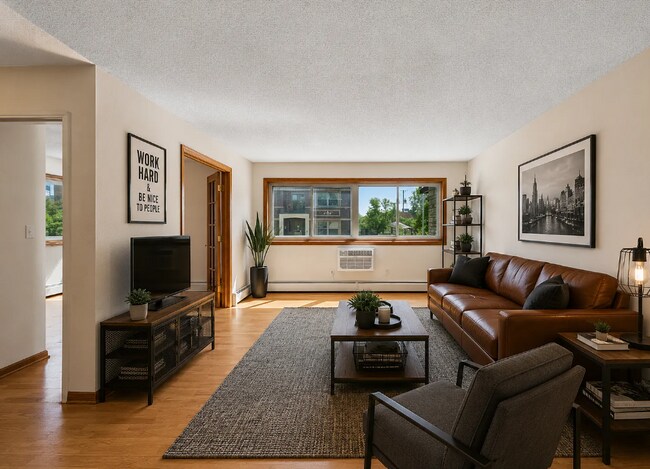 Building Photo - Awesome 2-Bed Condo Retreat in the Heart of Minneapolis  with Skyline views of Downtown