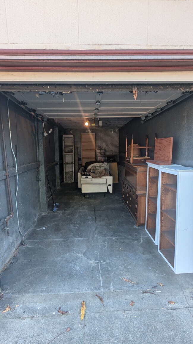 Dimensions 7'H + 12'L. Delivered empty. - 1201 Willard St