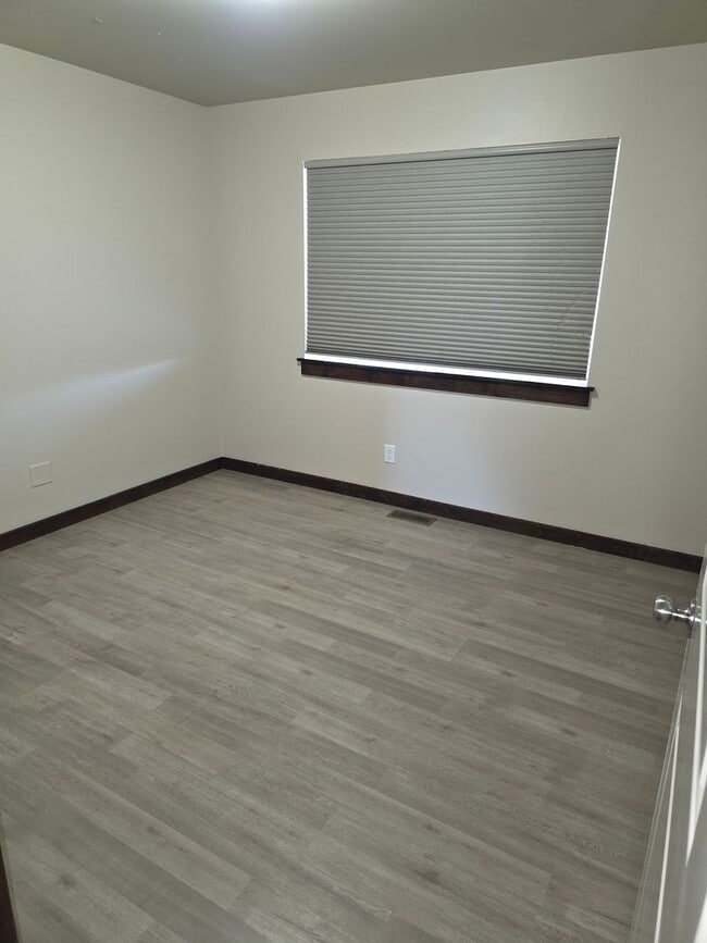Building Photo - $500 OFF First Month's Rent! Spacious 3BR/2BA Home in Quiet Belgrade Neighborhood with Fenced Bac...