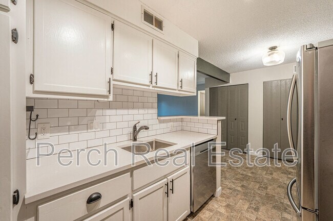 Building Photo - 7040 W 20th Ave