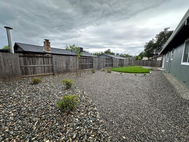 Building Photo - Updated Home with Island Kitchen, LVP Flooring, and Yard Care Included!