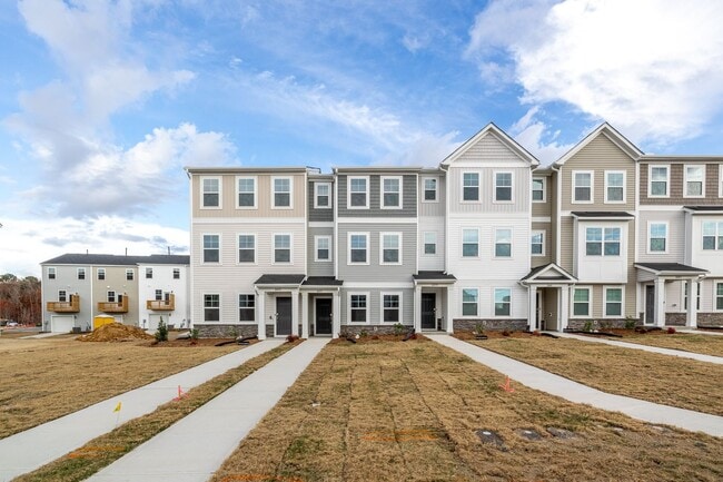 Building Photo - Stunning 3/3.5 Townhome in SE Raleigh