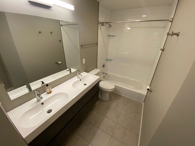 Building Photo - Modern Two Bedroom, 1.5 Bathroom Condo on ...