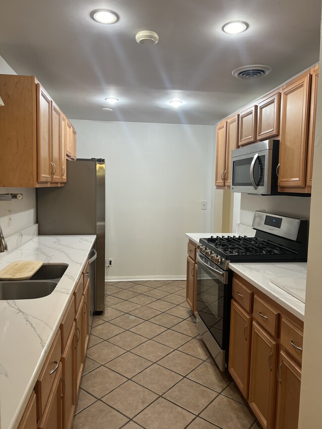 Large kitchen with stainless steel appliances - 6435 Green Valley Cir