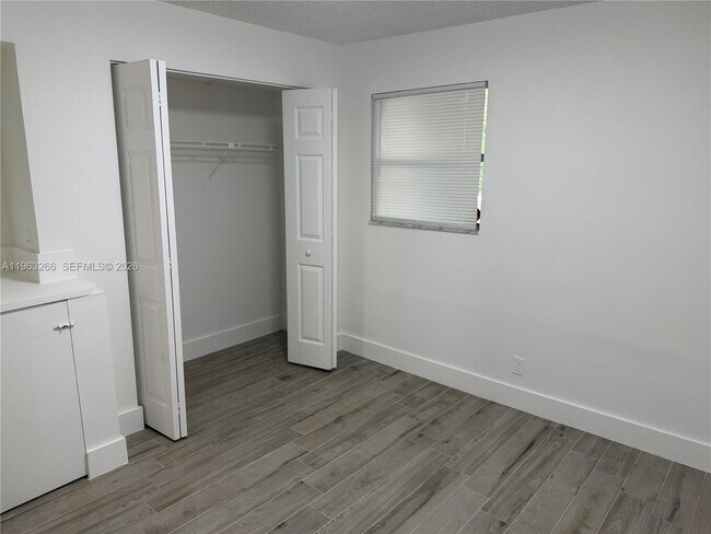 Building Photo - 2700 Coral Springs Dr